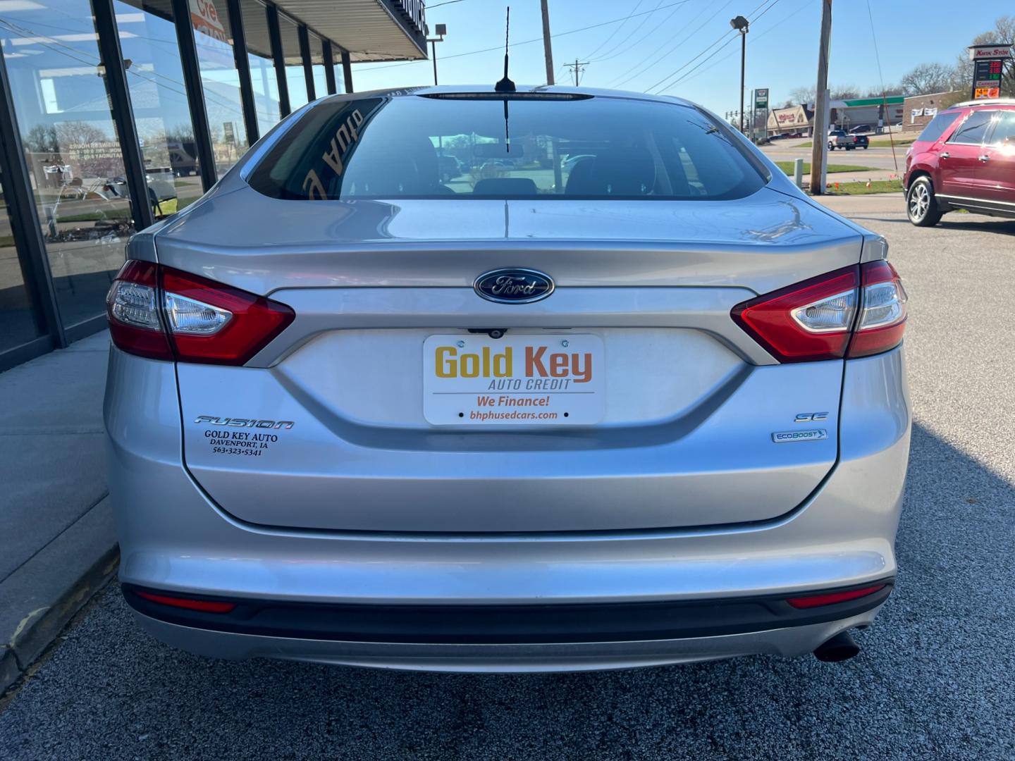 2015 Ingot Silver Ford Fusion SE (3FA6P0HD7FR) with an 1.5L L4 DOHC 16V engine, 6-Speed Automatic transmission, located at 1633 W Kimberly, Davenport, IA, 52806, (563) 323-5341, 41.559456, -90.598732 - Photo#4